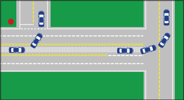 White and yellow lines mark a portion of the road where cars can prepare to make a left turn