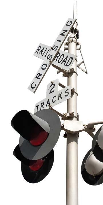 A crossbuck railroad crossing sign, 2 tracks, with lights off