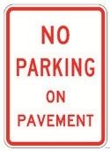 A white, vertical rectangular No Parking on Pavement sign