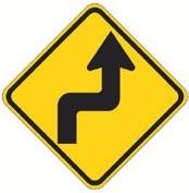 Yellow diamond two sharp turns sign