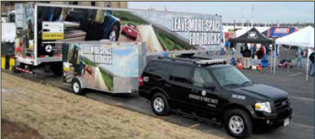 The Leave More Space is advertised on the side of trucks