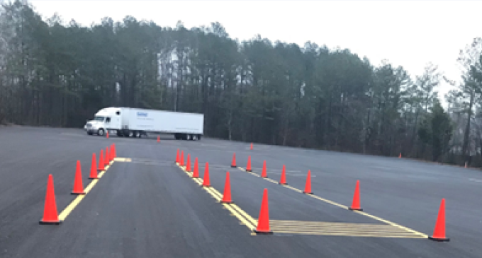 A truck driver completing a driver's test