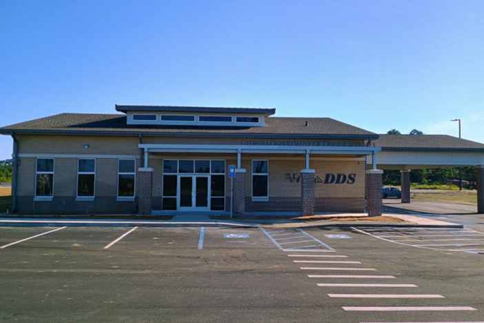 Front parking lot and building view of the GA Department of Driver Services Hazlehurst Customer Service Center.